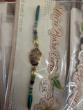 Designer stone Rakhi peacock