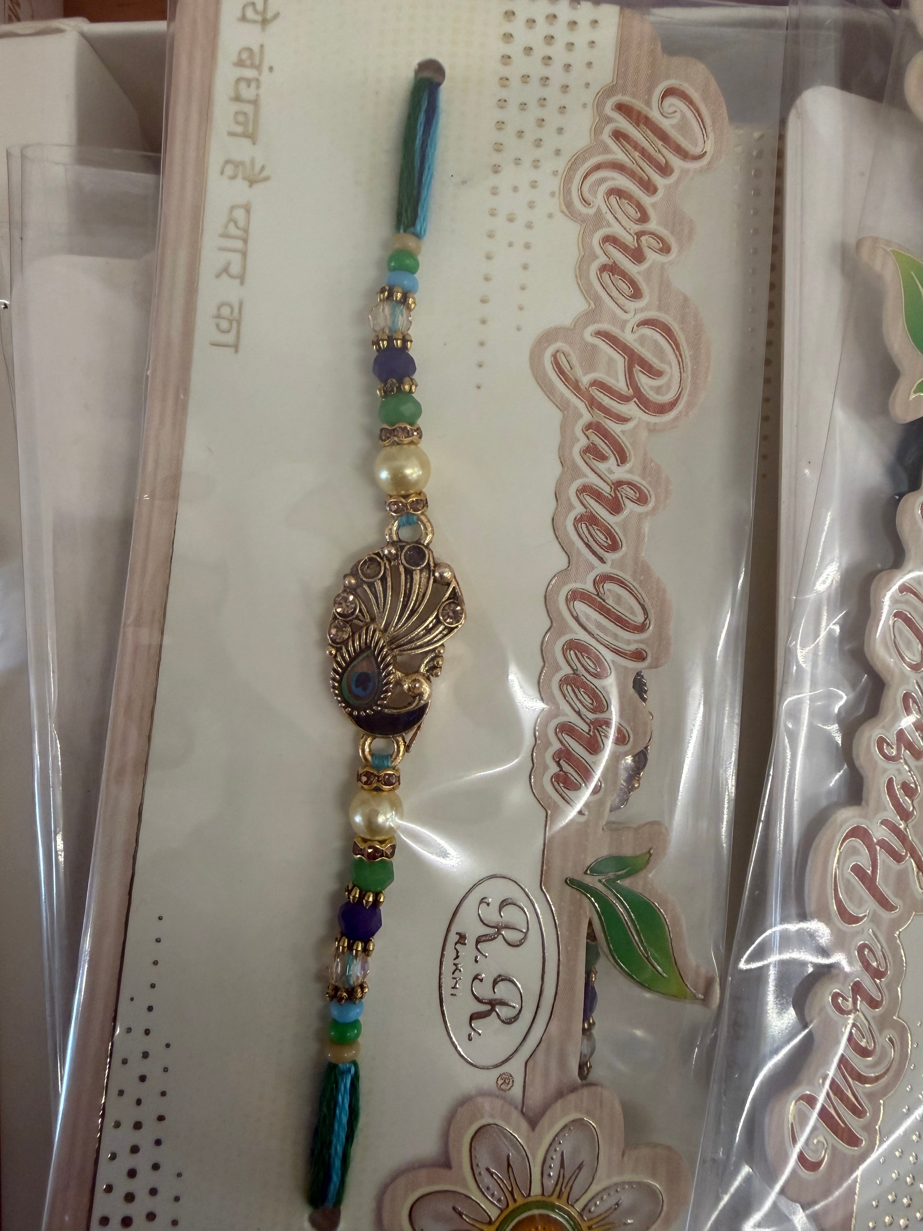 Designer stone Rakhi peacock