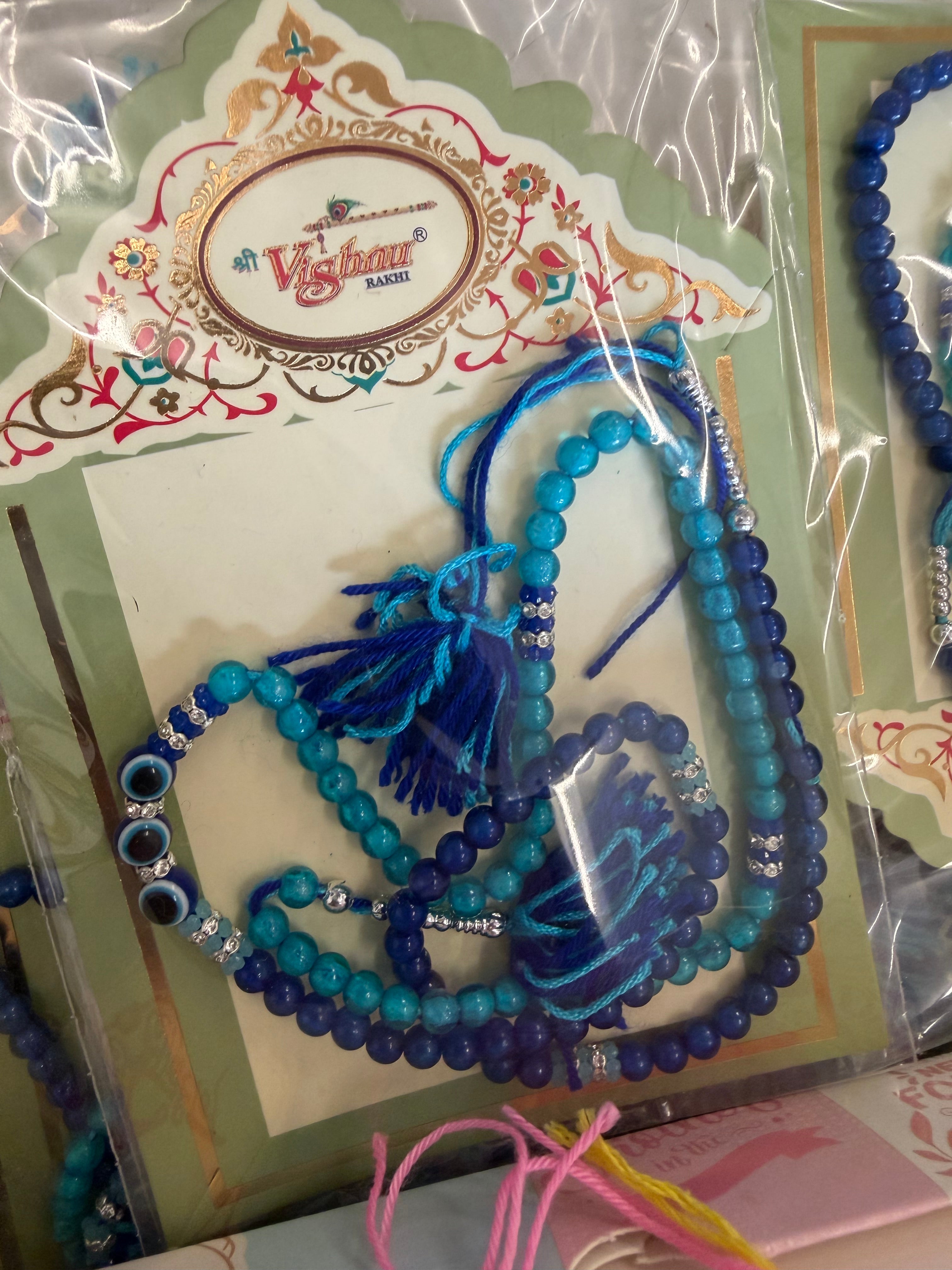 THREE EVIL EYE RAKHI BLUE